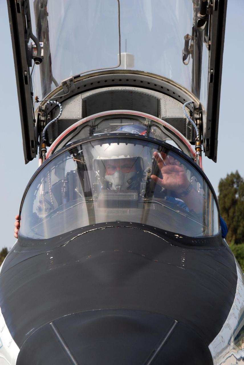 KENNEDY SPACE CENTER, FLA. -- At the NASA Kennedy Space Center's Shuttle Landing Facility, the first of the aircraft carrying STS-123 crew members is ready to taxi to the runway and take off for the return trip to Houston. The STS-123 crew members took part in a terminal countdown demonstration test, or TCDT, in preparation for the launch of space shuttle Endeavour scheduled on March 11. The TCDT enables astronauts and ground crews to participate in various countdown activities, including equipment familiarization and emergency egress training. On the STS-123 mission, Endeavour and its crew will deliver the first section of the Japan Aerospace Exploration Agency's Kibo laboratory and the Canadian Space Agency's two-armed robotic system, Dextre Photo credit: NASA/Kim Shiflett