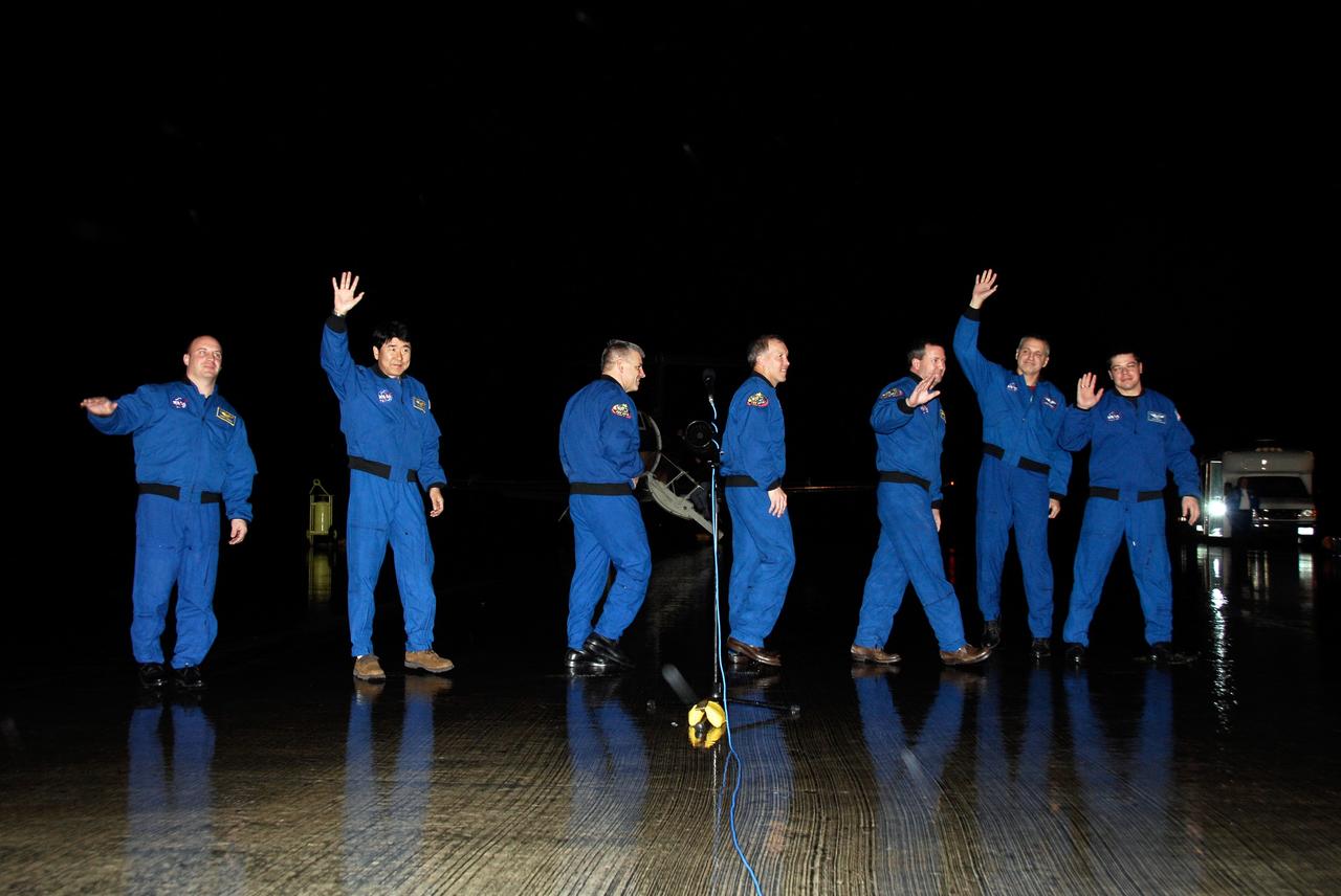 KENNEDY SPACE CENTER, FLA. -- At NASA Kennedy Space Center's Shuttle Landing Facility, the crew members of space shuttle Endeavour's STS-123 mission depart for Kennedy's astronaut quarters. The crew arrived at Kennedy to make final preparations for their launch, set for 2:28 a.m. EDT on March 11. From left are Mission Specialists Garrett Reisman, who will remain on the International Space Station as a flight engineer, and Takao Doi of the Japan Aerospace Exploration Agency; Pilot Gregory H. Johnson; Commander Dominic Gorie; and Mission Specialists Mike Foreman, Rick Linnehan and Robert L. Behnken. On this mission to the International Space Station, Endeavour and its crew will deliver the first section of the Japan Aerospace Exploration Agency's Kibo laboratory and the Canadian Space Agency's two-armed robotic system, Dextre. Photo credit: NASA/Kim Shiflett