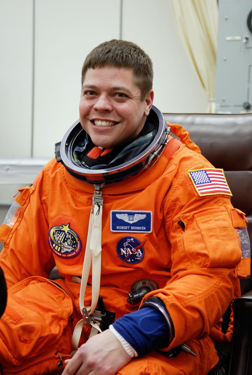 KENNEDY SPACE CENTER, FLA. -- STS-123 Mission Specialist Robert L. Behnken dons his launch and entry suit before heading to Launch Pad 39A for liftoff on space shuttle Endeavour. The crew will make a record-breaking 16-day mission to the International Space Station. On STS-123, Endeavour and its crew will deliver the first section of the Japan Aerospace Exploration Agency's Kibo laboratory and the Canadian Space Agency's two-armed robotic system, Dextre. Launch is scheduled for 2:28 a.m. EDT March 11. Photo credit: NASA/Kim Shiflett