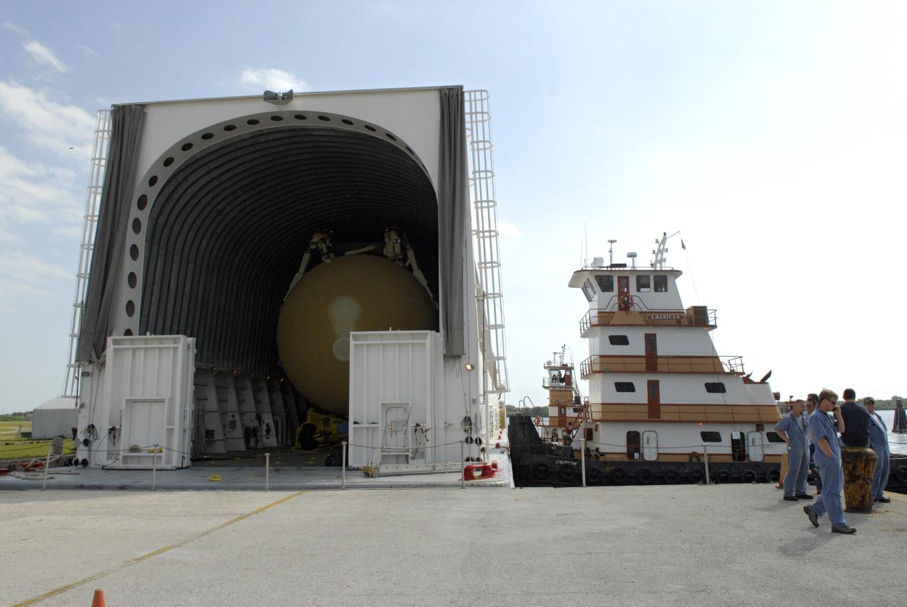 CAPE CANAVERAL, Fla. --- The Pegasus barge is docked at the turn basin in the Launch Complex 39 Area at NASA's Kennedy Space Center. The barge is carrying external tank No. 128 for space shuttle Discovery's STS-124 mission. After offloading, the tank will be transported to the Vehicle Assembly Building. On the STS-124 mission, Discovery will transport the Kibo Japanese Experiment Module - Pressurized Module and the Japanese Remote Manipulator System to the International Space Station. Discovery is targeted for launch on May 25. Photo credit: NASA/Dimitri Gerondidakis