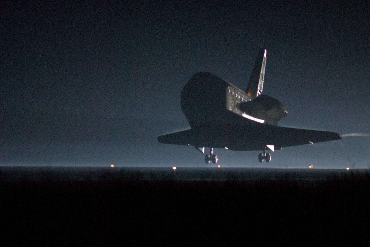 CAPE CANAVERAL, Fla. --- As night falls on NASA's Kennedy Space Center, space shuttle Endeavour touches down on Runway 15 at the Shuttle Landing Facility to end the STS-123 mission, a 16-day flight to the International Space Station.  This was the 16th night landing at Kennedy.  The main landing gear touched down at 8:39:08 p.m. EDT.  The nose landing gear touched down at 8:39:17 p.m. and wheel stop was at 8:40:41 p.m.  The mission completed nearly 6.6 million miles.  The landing was on the second opportunity after the first was waved off due to unstable weather in the Kennedy Space Center area.  The STS-123 mission delivered the first segment of the Japan Aerospace Exploration Agency's Kibo laboratory and the Canadian Space Agency's two-armed robotic system, known as Dextre.  Photo credit: NASA/Kevin O'Connell