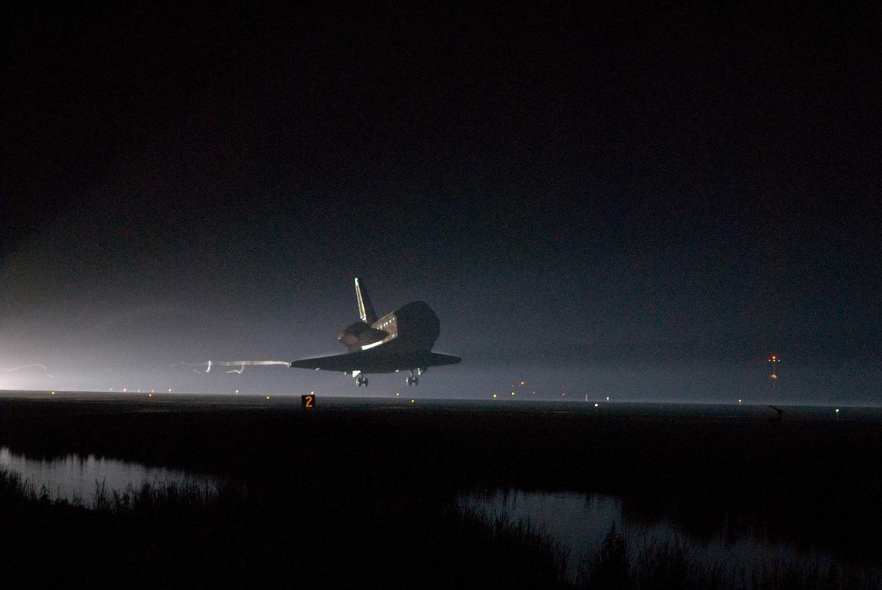 CAPE CANAVERAL, Fla. --- As night falls on NASA's Kennedy Space Center, space shuttle Endeavour nears touchdown on Runway 15 at the Shuttle Landing Facility to end the STS-123 mission, a 16-day flight to the International Space Station.  This was the 16th night landing at Kennedy.  The main landing gear touched down at 8:39:08 p.m. EDT.  The nose landing gear touched down at 8:39:17 p.m. and wheel stop was at 8:40:41 p.m.  The mission completed nearly 6.6 million miles.  The landing was on the second opportunity after the first was waved off due to unstable weather in the Kennedy Space Center area.  The STS-123 mission delivered the first segment of the Japan Aerospace Exploration Agency's Kibo laboratory and the Canadian Space Agency's two-armed robotic system, known as Dextre.  Photo credit: NASA/Mike Kerley