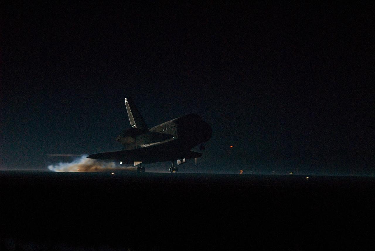 CAPE CANAVERAL, Fla. --- As night falls on NASA's Kennedy Space Center, space shuttle Endeavour touches down on Runway 15 at the Shuttle Landing Facility to end the STS-123 mission, a 16-day flight to the International Space Station.  This was the 16th night landing at Kennedy.  The main landing gear touched down at 8:39:08 p.m. EDT.  The nose landing gear touched down at 8:39:17 p.m. and wheel stop was at 8:40:41 p.m.  The mission completed nearly 6.6 million miles.  The landing was on the second opportunity after the first was waved off due to unstable weather in the Kennedy Space Center area.  The STS-123 mission delivered the first segment of the Japan Aerospace Exploration Agency's Kibo laboratory and the Canadian Space Agency's two-armed robotic system, known as Dextre.  Photo credit: NASA/Mike Kerley