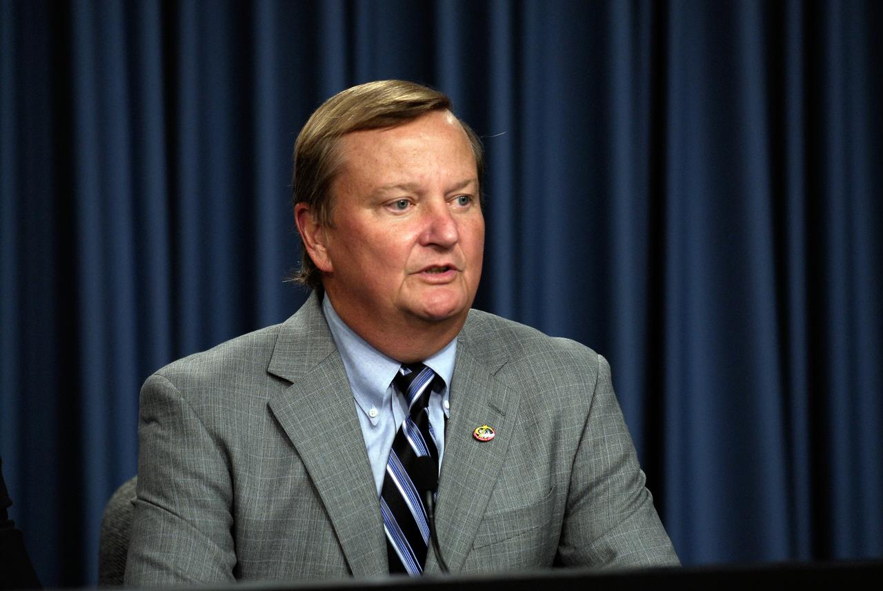 CAPE CANAVERAL, Fla. --- Mike Leinbach, NASA space shuttle launch director, answers a question during a media briefing held after the successful landing of space shuttle Endeavour to conclude the STS-123 mission.  Endeavour landed on the second opportunity, on orbit 250, at 8:39:08 p.m. EDT.  The STS-123 mission delivered the first segment of the Japan Aerospace Exploration Agency's Kibo laboratory and the Canadian Space Agency's two-armed robotic system, known as Dextre.   Photo credit: NASA/Kim Shiflett