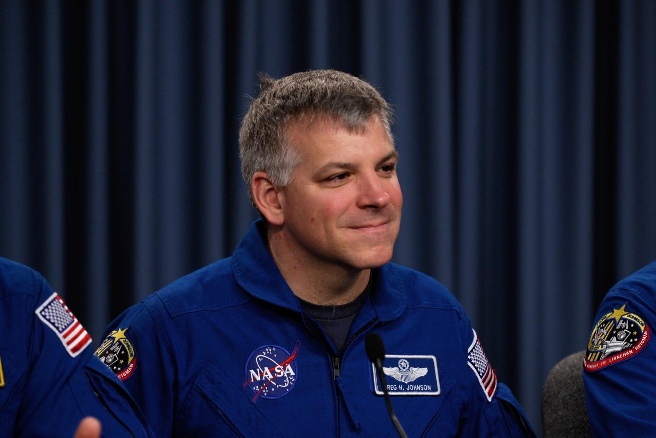 CAPE CANAVERAL, Fla. ---  STS-123 Pilot Gregory H. Johnson talks to the media about his experiences on the mission to the International Space Station.  The crew landed at Kennedy aboard space shuttle Endeavour at 8:39 p.m. EDT March 26.  Endeavour's 16-day flight was the longest shuttle mission to the International Space Station and included a record five spacewalks. The shuttle's seven astronauts worked with the three-member station crew and ground teams around the world to install the first section of the Japan Aerospace Exploration Agency's Kibo laboratory and the Canadian Space Agency's two-armed robotic system, known as Dextre.  Photo credit: NASA/Kim Shiflett