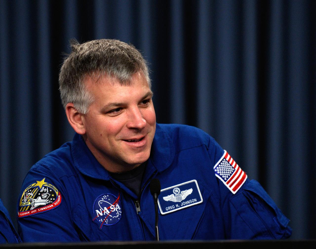 CAPE CANAVERAL, Fla. ---  STS-123 Pilot Gregory H. Johnson talks to the media about his experiences on the mission to the International Space Station.  The crew landed at Kennedy aboard space shuttle Endeavour at 8:39 p.m. EDT March 26.  Endeavour's 16-day flight was the longest shuttle mission to the International Space Station and included a record five spacewalks. The shuttle's seven astronauts worked with the three-member station crew and ground teams around the world to install the first section of the Japan Aerospace Exploration Agency's Kibo laboratory and the Canadian Space Agency's two-armed robotic system, known as Dextre.  Photo credit: NASA/Kim Shiflett