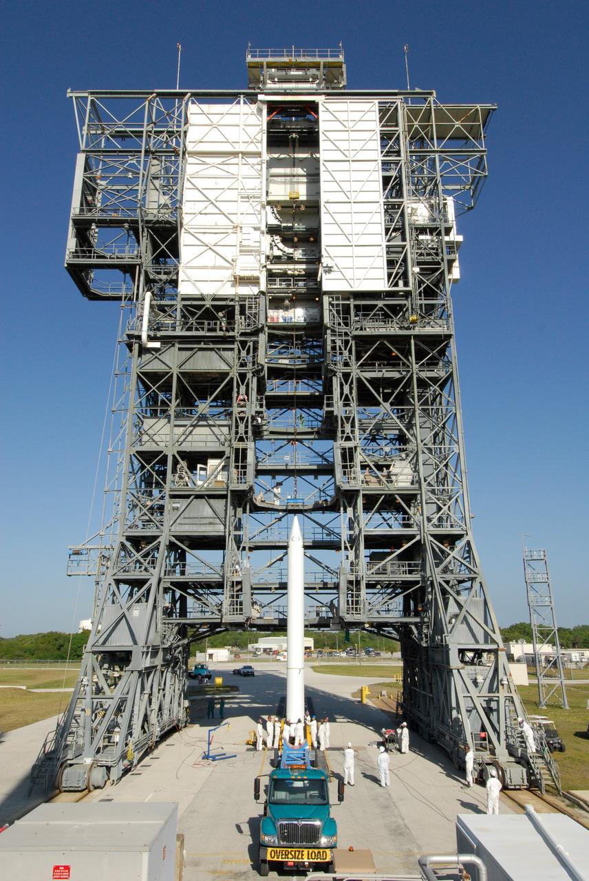 CAPE CANAVERAL, Fla. ---  At Pad 17-B on Cape Canaveral Air Force Station, a solid rocket booster is ready to be lifted into the mobile service tower for mating with the Delta II rocket to launch NASA's Gamma-ray Large Area Space Telescope, or GLAST, spacecraft.  A series of nine strap-on solid rocket motors will help power the first stage.  The GLAST is a powerful space observatory that will explore the Universe's ultimate frontier, where nature harnesses forces and energies far beyond anything possible on Earth;  probe some of science's deepest questions, such as what our Universe is made of, and search for new laws of physics; explain how black holes accelerate jets of material to nearly light speed; and help crack the mystery of stupendously powerful explosions known as gamma-ray bursts.  Launch is currently planned for May 16 from Pad 17-B.   Photo credit: NASA/Dimitri Gerondidakis