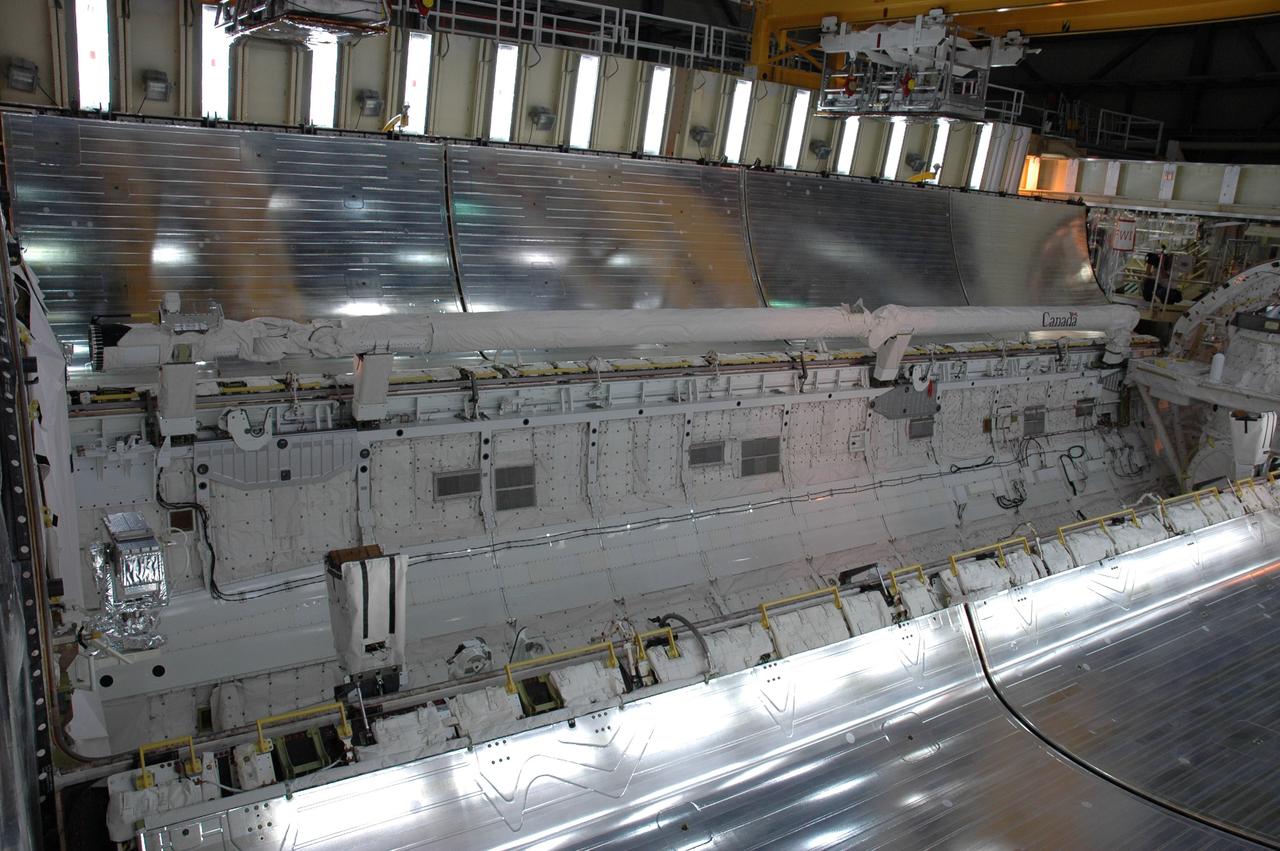 CAPE CANAVERAL, Fla. --- In Orbiter Processing Facility Bay 3 at NASA's Kennedy Space Center, space shuttle Discovery's payload bay doors are ready to close. Along the hinge of the door at left is the shuttle's robotic arm. Discovery is the designated vehicle on the STS-124 mission to the International Space Station. On the mission, the shuttle will transport the Kibo Japanese Experiment Module - Pressurized Module and the Japanese Remote Manipulator System. The payload will be installed at the launch pad. Launch is targeted for May 25. Photo credit: NASA/Chris Rhodes