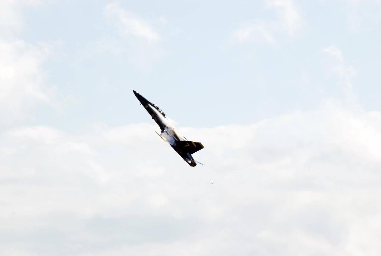 CAPE CANAVERAL, Fla. -- After meeting with NASA officials about their involvement in the second annual Space & Air Show at Kennedy Space Center Nov. 8-9, Blue Angel pilots Lt. Frank Weisser and Lt. Dan McShane take off from the Shuttle Landing Facility aboard their U.S. Navy F-18 Hornet for the return flight to their home base in Pensacola, Fla.   The air show will be only the second time the Blue Angels have performed at Kennedy.  Their precision flight team will perform high-speed passes, fast rolls, mirror formations, tight turns and their signature Delta formation showcasing the capabilities of the powerful aircraft.  The 2008 Space & Air Show will include aircraft displays and space-related exhibits on the ground and plenty of action in the skies over Kennedy.  Returning to the show is the 920th Rescue Wing, an Air Force Reserve Command combat search and rescue unit based at Patrick Air Force Base in Central Florida. Also, more than 20 astronauts and special guests will be on hand to personally meet guests, pose for photos and sign memorabilia.  Photo credit: NASA/Kim Shiflett