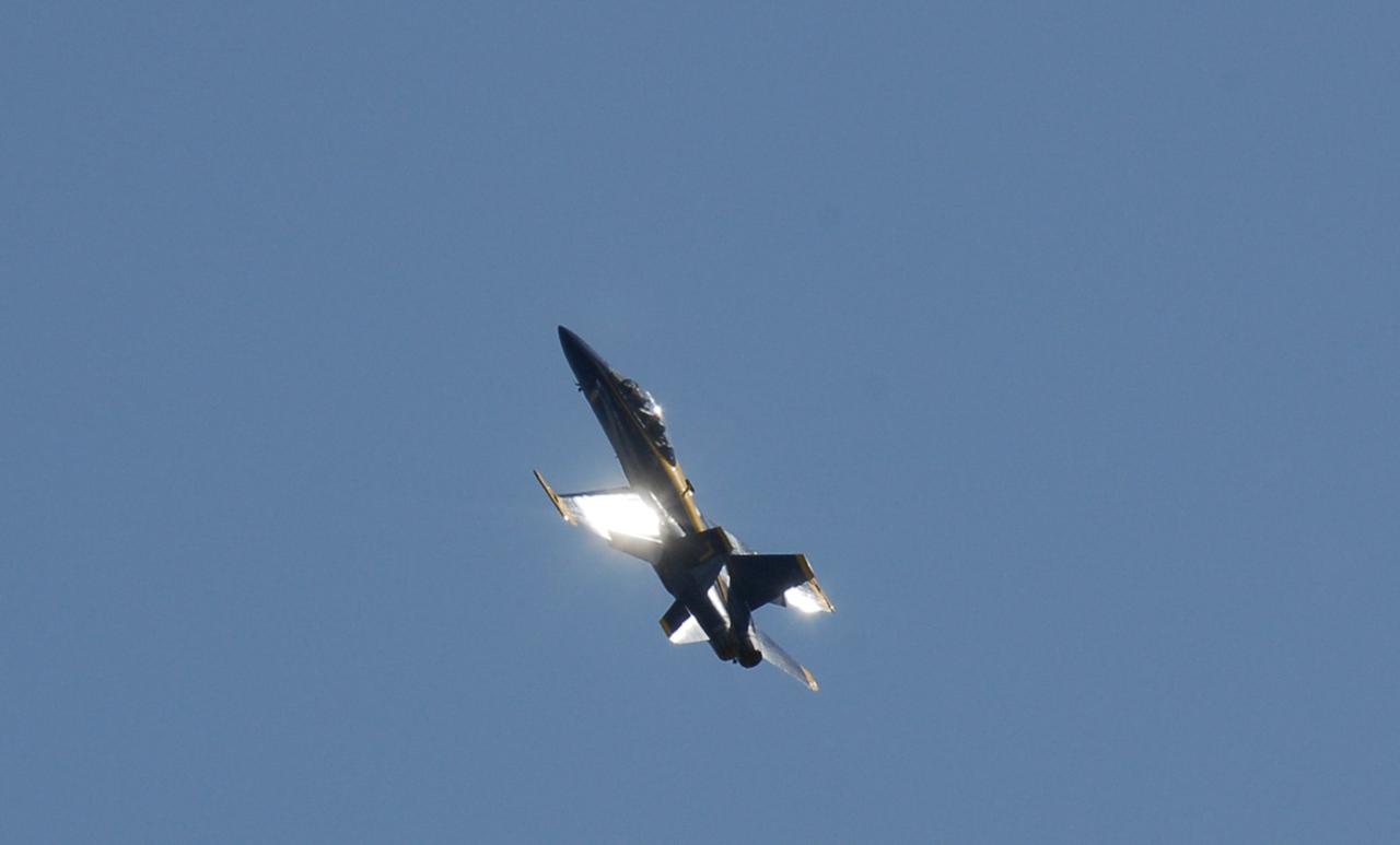 CAPE CANAVERAL, Fla. -- After meeting with NASA officials about their involvement in the second annual Space & Air Show at Kennedy Space Center Nov. 8-9, Blue Angel pilots Lt. Frank Weisser and Lt. Dan McShane take off from the Shuttle Landing Facility aboard their U.S. Navy F-18 Hornet for the return flight to their home base in Pensacola, Fla.  The air show will be only the second time the Blue Angels have performed at Kennedy.  Their precision flight team will perform high-speed passes, fast rolls, mirror formations, tight turns and their signature Delta formation showcasing the capabilities of the powerful aircraft.  The 2008 Space & Air Show will include aircraft displays and space-related exhibits on the ground and plenty of action in the skies over Kennedy.  Returning to the show is the 920th Rescue Wing, an Air Force Reserve Command combat search and rescue unit based at Patrick Air Force Base in Central Florida. Also, more than 20 astronauts and special guests will be on hand to personally meet guests, pose for photos and sign memorabilia.  Photo credit: NASA/Kim Shiflett