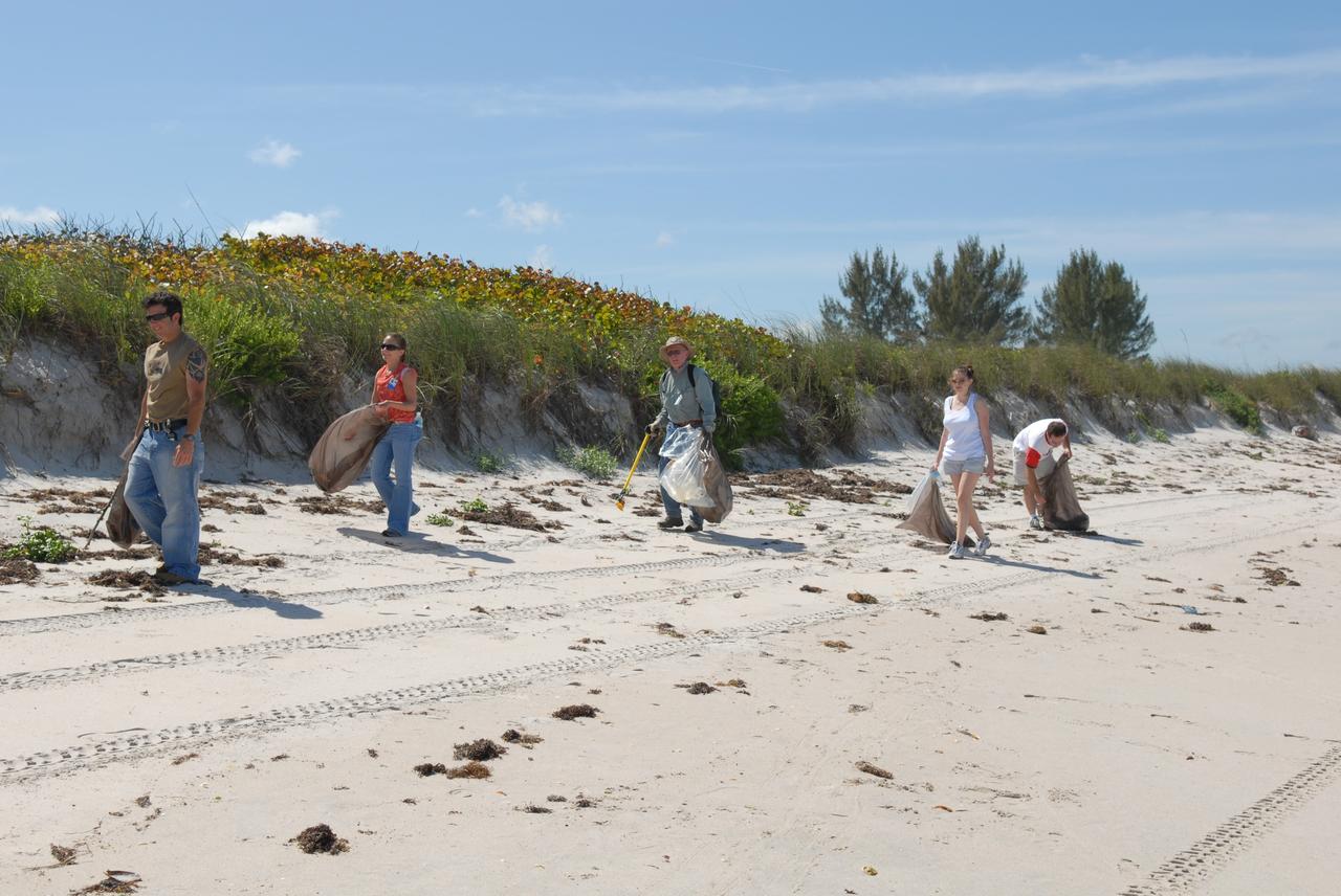 CAPE CANAVERAL, Fla. --   On a beach on NASA's Kennedy Space Center, more than 130 volunteers from the joint NASA’s Kennedy Space Center and U.S. Fish and Wildlife Service contract organizations give up their afternoon to gather all the “unnatural” items that had accumulated on 6.1 miles of central Florida east coast shoreline during the past 12 months. Part of the center's dedication to a clean environment,  volunteers gathered enough trash to fill approximately 450 garbage bags and enough recyclable plastic and glass to fill 150 bags.   Photo credit: NASA/Dimitri Gerondidakis