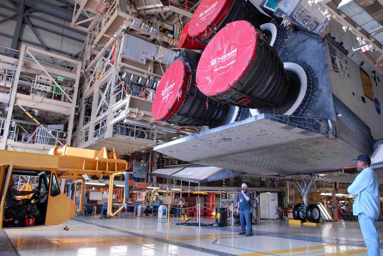 CAPE CANAVERAL, Fla. -- In Orbiter Processing Facility Bay 3 at NASA’s Kennedy Space Center, space shuttle Discovery is ready for the Orbiter Transport System, or OTS (left), to be rolled in underneath. The OTS will help move the orbiter on its rollover to the Vehicle Assembly Building. Discovery is targeted to launch May 31 on the STS-124 mission to the International Space Station. On the mission, Discovery will transport the Kibo Japanese Experiment Module - Pressurized Module (JEM-PM) and the Japanese Remote Manipulator System (JEM-RMS) to the space station to add to the Kibo laboratory. Photo credit: NASA/Troy Cryder