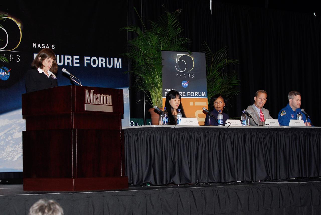 CAPE CANAVERAL, Fla. --  One of the panels conducted during NASA’s Future Forum in Miami featured (left to right) Penny Haskins (at the podium), associate director of the Florida Space Grant Consortium; Okhee Lee-Salwen, with the University of Miami’s College of Education; Bernice Alston, NASA deputy assistant administrator for education; Frank Brogan, president of Florida Atlantic University and former Florida lieutenant governor; Steve Frick, astronaut and commander of the STS-122 space shuttle mission.  The forum, which focused on how space exploration benefits Florida's economy, was held at the University of Miami's BankUnited Center and included presentations and panels.   Among those participating were NASA Deputy Administrator Shana Dale, astronaut Carl Walz, director of the Advanced Capabilities Division in NASA's Exploration Systems Mission Directorate, and Russell Romanella, director, International Space Station and Spacecraft Processing.   Photo credit: NASA/Kim Shiflett