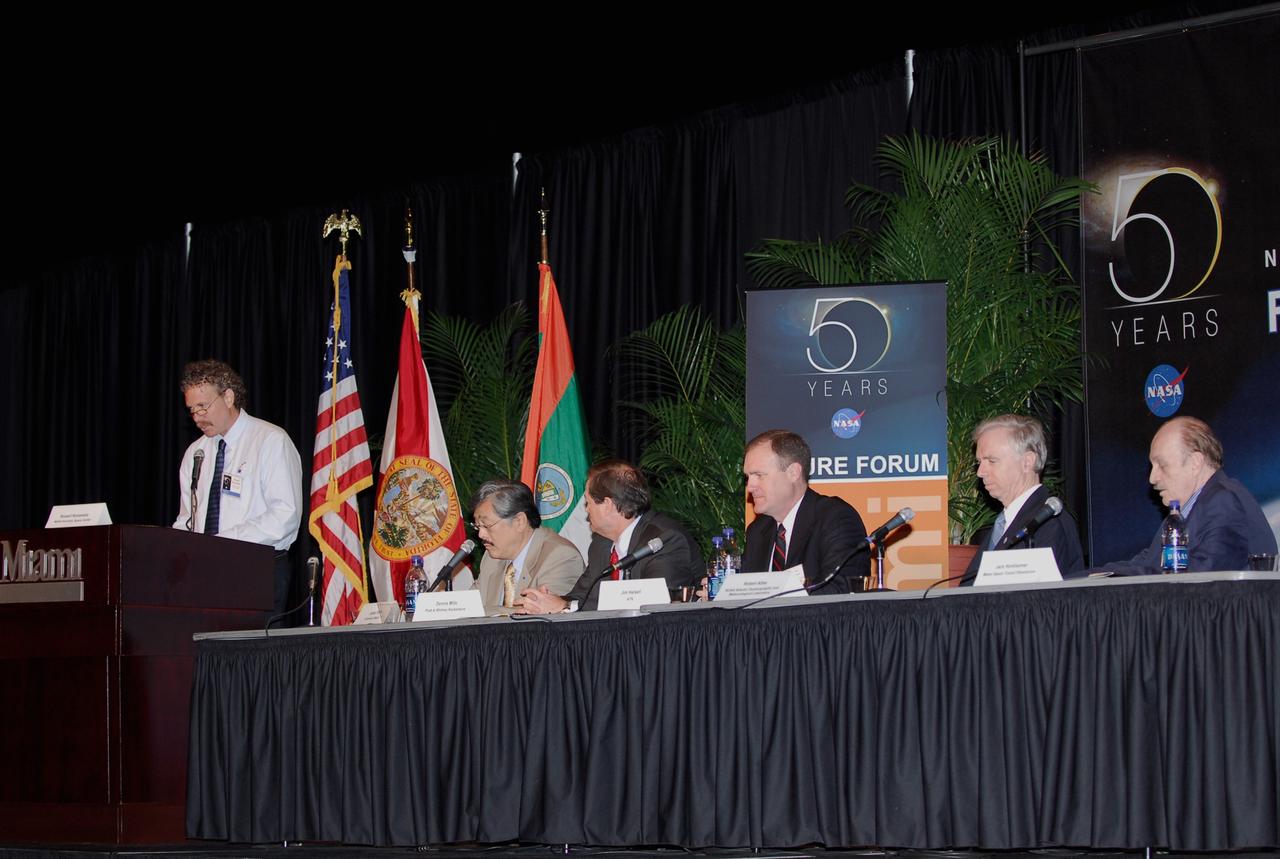 CAPE CANAVERAL, Fla. --  At the podium, Russell Romanella, director of International Space Station and Spacecraft Processing at Kennedy Space Center, moderates a panel presenting “Pushing the Limits of Knowledge To Inspire New Generations” during NASA’s Future Forum in Miami. Others on the panel include James Tien, dean of engineering at the University of Miami; Dennis Mills, with UTC/Pratt Whitney Rocketdyne; Jim Halsell, former astronaut; Robert Atlas, director of NOAA's Atlantic Oceanographic and Meteorological Laboratory; and Jack Horkheimer, executive director of the Miami Space Transit Planetarium. The forum focused on how space exploration benefits Florida's economy. The event, which included presentations and panels, was held at the University of Miami's BankUnited Center.  Among those participating were NASA Deputy Administrator Shana Dale, astronaut Carl Walz, director of the Advanced Capabilities Division in NASA's Exploration Systems Mission Directorate, and Russell Romanella, director, International Space Station and Spacecraft Processing.   Photo credit: NASA/Kim Shiflett