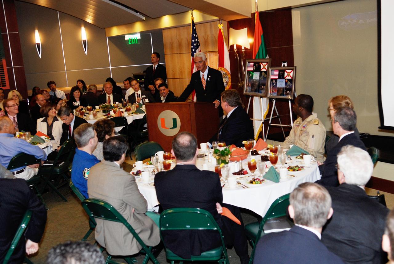 CAPE CANAVERAL, Fla. --  Florida Gov. Charlie Crist (center, by the podium) makes an appearance at the luncheon held during NASA’s Future Forum in Miami.  The keynote presentation was given by astronaut Steve Frick, who was commander of the STS-122 shuttle mission.  The forum focused on how space exploration benefits Florida's economy. The event, which included presentations and panels, was held at the University of Miami's BankUnited Center.  Among those participating were NASA Deputy Administrator Shana Dale, astronaut Carl Walz, director of the Advanced Capabilities Division in NASA's Exploration Systems Mission Directorate, and Russell Romanella, director, International Space Station and Spacecraft Processing.   Photo credit: NASA/Kim Shiflett