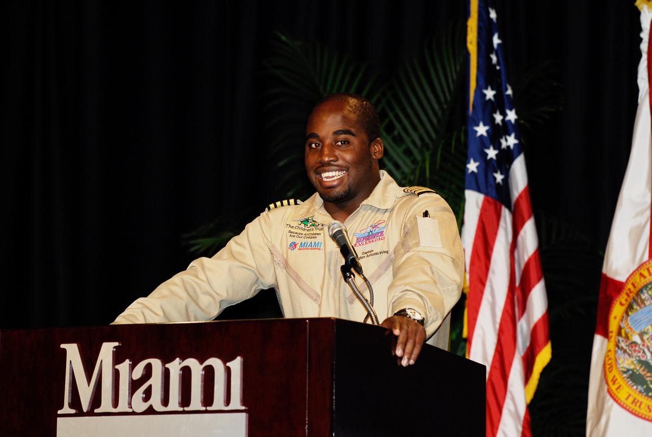 CAPE CANAVERAL, Fla. --  At the luncheon held during NASA’s Future Forum in Miami, Barrington Irving talks about his experiences as the first African-American and youngest person to fly solo around the world. The forum focused on how space exploration benefits Florida's economy. The event, which included presentations and panels, was held at the University of Miami's BankUnited Center.  Among those participating were NASA Deputy Administrator Shana Dale, astronaut Carl Walz, director of the Advanced Capabilities Division in NASA's Exploration Systems Mission Directorate, and Russell Romanella, director, International Space Station and Spacecraft Processing.   Photo credit: NASA/Kim Shiflett