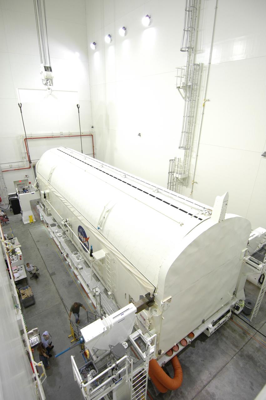 CAPE CANAVERAL, Fla. -- In the Vertical Integration Facility at NASA's Kennedy Space Center, the payload canister containing the Japanese Experiment Module -Pressurized Module is ready for rotation to a vertical position.  The canister will be transported to Launch Pad 39A for space shuttle Discovery’s STS-124 mission.  At the pad, the payload will be transferred from the canister into the payload changeout room on the rotating service structure.  The changeout room is the enclosed, environmentally controlled portion of the service structure that supports cargo delivery to the pad and subsequent vertical installation into an orbiter's payload bay. On the mission, the STS-124 crew will transport the JEM as well as the Japanese Remote Manipulator System to the International Space Station.  The launch of Discovery is targeted for May 31.    Photo credit: NASA/Jim Grossmann