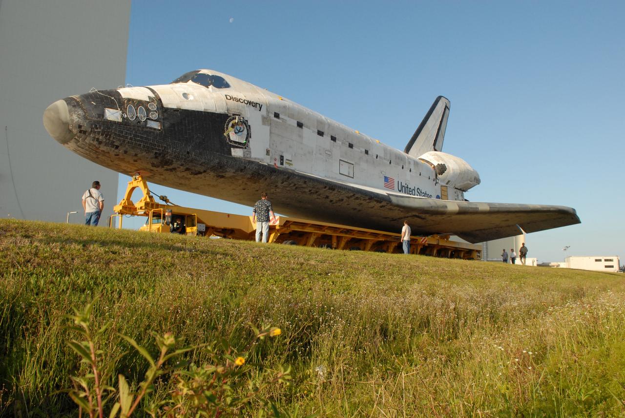 CAPE CANAVERAL, Fla. --  Resting on its 76-wheeled orbiter transporter, space shuttle Discovery rolls toward the Vehicle Assembly Building, or VAB, at NASA's Kennedy Space Center.  Inside the VAB, Discovery will be attached to its external fuel tank and solid rocket boosters in high bay 3 in preparation for its upcoming STS-124 mission to the International Space Station. On the mission, the STS-124 crew will transport the Japanese Experiment Module - Pressurized Module and the Japanese Remote Manipulator System to the space station.  Launch of Discovery is targeted for May 31. Photo credit: NASA/Troy Cryder