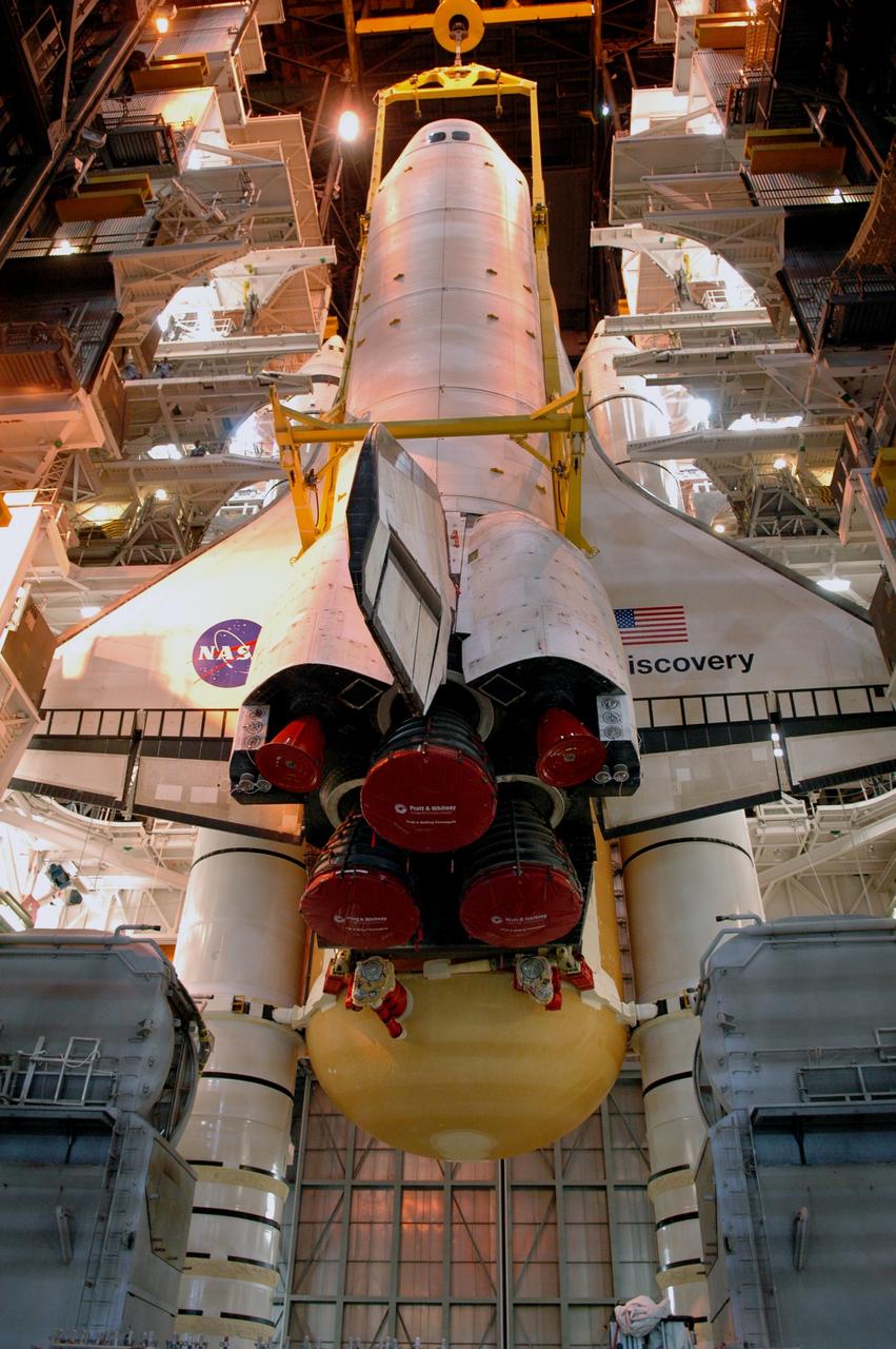 CAPE CANAVERAL, Fla. – In high bay 3 of the Vehicle Assembly Building at NASA's Kennedy Space Center, space shuttle Discovery continues to be lowered onto the mobile launcher platform in front of the solid rocket boosters and external tank. The stacking is in preparation for the launch on the upcoming STS-124 mission to the International Space Station. On the mission, the STS-124 crew will transport the Japanese Experiment Module - Pressurized Module and the Japanese Remote Manipulator System to the space station. Launch of Discovery is targeted for May 31 Photo credit: NASA/Jim Grossmann