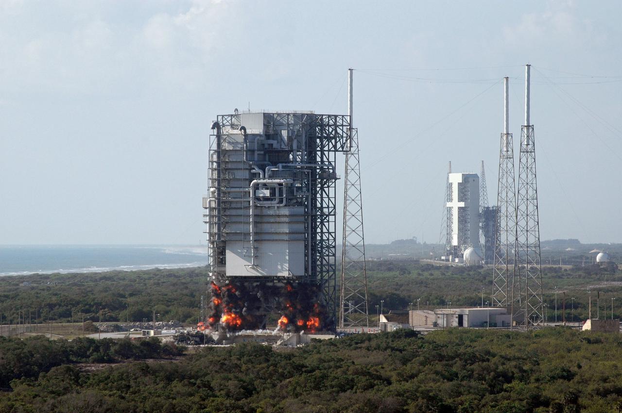 CAPE CANAVERAL, Fla. – Fire erupts beneath the mobile service tower, or gantry, at Space Launch Complex 40 on Cape Canaveral Air Force Station signals the beginning of its demolition. The tall lightning towers around it will remain. This mammoth structure, with its cavernous clean room, was used for the final spacecraft launch preparations for NASA’s Cassini spacecraft, currently orbiting Saturn. The launch occurred on Oct. 15, 1997, aboard an Air Force Titan IV-Centaur rocket. The facilities at the pad are being dismantled to make room for the construction of launch pad access and servicing facilities for the new Falcon rockets to be launched by Space Exploration Technologies, known as SpaceX. Photo credit: NASA/Cory Huston