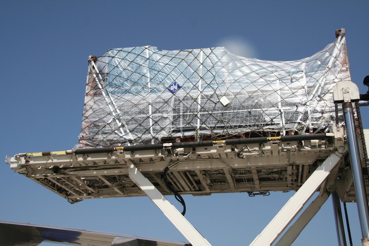 VANDENBERG AIR FORCE BASE, Calif.  –  Ground support equipment associated with the OSTM/Jason-2 satellite is offloaded from the cargo plane at Vandenberg Air Force Base.  The equipment will accompany the satellite to the Astrotech processing facility.  The OSTM, or Ocean Topography Mission, on the Jason-2 satellite is a follow-on to Jason-1. It will take oceanographic studies of sea surface height into an operational mode for continued climate forecasting research and science and industrial applications.  This satellite altimetry data will help determine ocean circulation, climate change and sea-level rise. OSTM is a joint effort by the National Oceanic and Atmospheric Administration, NASA, France’s Centre National d’Etudes Spatiales and the European Meteorological Satellite Organisation. OSTM/Jason-2 will be launched aboard a United Launch Alliance Delta II 7320 from Vandenberg on June 15. Photo credit: NASA/Steve Greenberg, JPL