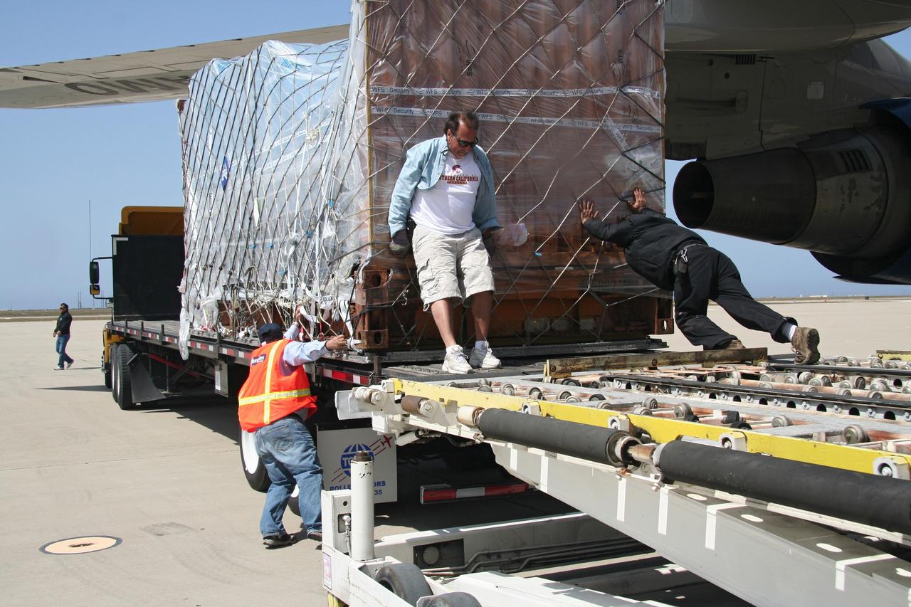VANDENBERG AIR FORCE BASE, Calif.  –   Ground support equipment associated with the OSTM/Jason-2 satellite is placed on a flatbed truck at Vandenberg Air Force Base.  The equipment will accompany the satellite to the Astrotech processing facility.  The OSTM, or Ocean Topography Mission, on the Jason-2 satellite is a follow-on to Jason-1. It will take oceanographic studies of sea surface height into an operational mode for continued climate forecasting research and science and industrial applications.  This satellite altimetry data will help determine ocean circulation, climate change and sea-level rise. OSTM is a joint effort by the National Oceanic and Atmospheric Administration, NASA, France’s Centre National d’Etudes Spatiales and the European Meteorological Satellite Organisation. OSTM/Jason-2 will be launched aboard a United Launch Alliance Delta II 7320 from Vandenberg on June 15. Photo credit: NASA/Steve Greenberg, JPL