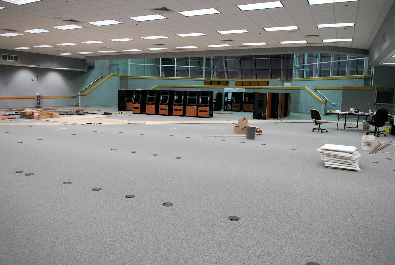CAPE CANAVERAL, Fla. -- A near-empty Firing Room No. 1 in the Launch Control Center at NASA's Kennedy Space Center is ready for the installation of racks of equipment. The firing room will support the future Ares rocket launches as part of the Constellation Program. Future astronauts will ride to orbit on Ares I, which uses a single five-segment solid rocket booster, a derivative of the space shuttle's solid rocket booster, for the first stage. Ares will be launched from Pad 39B, which is being reconfigured from supporting space shuttle launches. The Launch Control Center firing rooms face the launch pads. Photo credit: NASA/Kim Shiflett