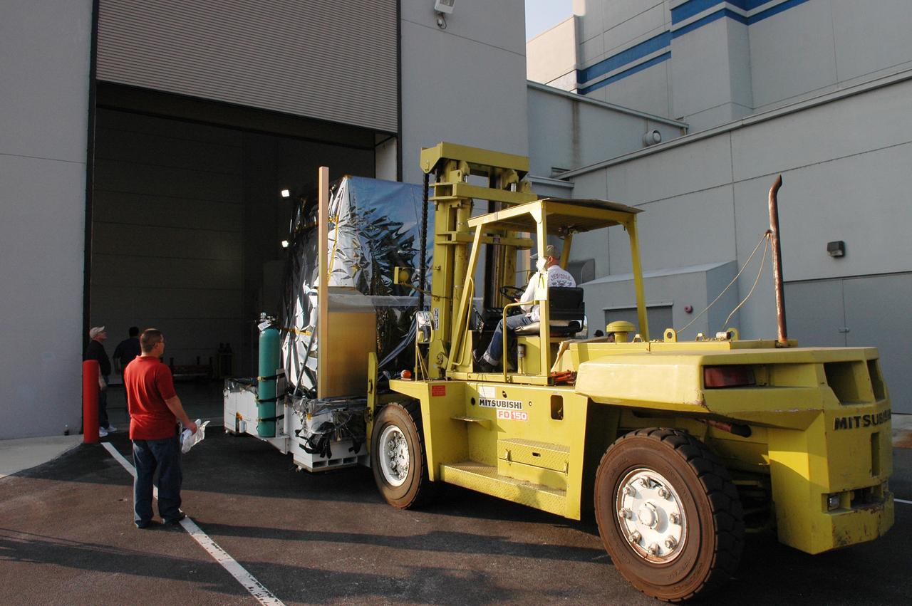 CAPE CANAVERAL, Fla. --  NASA's Gamma-ray Large Area Space Telescope, or GLAST, spacecraft is moved into the Hazardous Processing Facility for fueling. The GLAST is a powerful space observatory that will explore the Universe's ultimate frontier, where nature harnesses forces and energies far beyond anything possible on Earth;  probe some of science's deepest questions, such as what our Universe is made of, and search for new laws of physics; explain how black holes accelerate jets of material to nearly light speed; and help crack the mystery of stupendously powerful explosions known as gamma-ray bursts. A launch date still is to be determined. Photo credit: NASA/Jim Grossmann