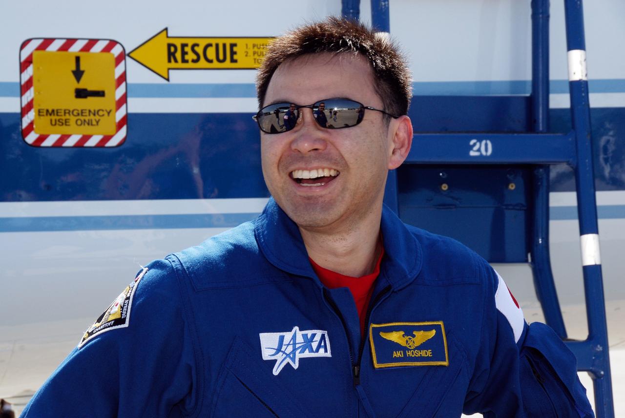 CAPE CANAVERAL, Fla. -- The crew of space shuttle Discovery's STS-124 mission arrive at NASA Kennedy Space Center's Shuttle Landing Facility to take part in the Terminal Countdown Demonstration Test, or TCDT. Mission Specialist Akihiko Hoshide, seen here, arrived with Pilot Ken Ham aboard a T-38 jet aircraft. Hoshide represents the Japan Aerospace Exploration Agency, or JAXA. TCDT is a rehearsal for launch that includes practicing emergency procedures, handling on-orbit equipment, and simulating a launch countdown. On the STS-124 mission, the crew will deliver and install the Japanese Experiment Module – Pressurized Module and Japanese Remote Manipulator System. Discovery's launch is targeted for May 31. Photo credit: NASA/Kim Shiflett