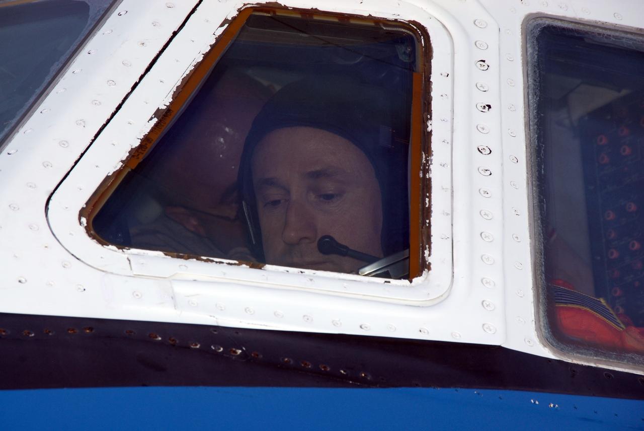 CAPE CANAVERAL, Fla. -- STS-124 Pilot Ken Ham is seen through the cockpit window of NASA's Shuttle Training Aircraft, or STA, before taxiing to the runway at the NASA Kennedy Space Center Shuttle Landing Facility to practice space shuttle landings. The STA is a Grumman American Aviation-built Gulf Stream II jet that was modified to simulate an orbiter's cockpit, motion and visual cues, and handling qualities. In flight, the STA duplicates the orbiter's atmospheric descent trajectory from approximately 35,000 feet altitude to landing on a runway. Because the orbiter is unpowered during re-entry and landing, its high-speed glide must be perfectly executed the first time. The crew for space shuttle Discovery's STS-124 mission is at Kennedy for a full launch dress rehearsal, known as the terminal countdown demonstration test, or TCDT. Providing astronauts and ground crews with an opportunity to participate in various simulated countdown activities, TCDT includes equipment familiarization and emergency training. Discovery's launch is targeted for May 31. Photo credit: NASA/Kim Shiflett