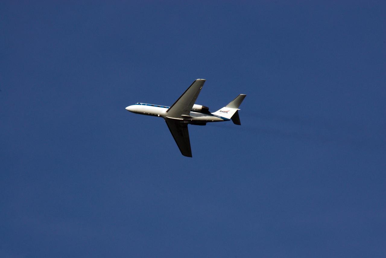 CAPE CANAVERAL, Fla. -- NASA's Shuttle Training Aircraft, or STA, soars into the blue Florida sky to begin the space shuttle landing practice. STS-124 Commander Mark Kelly or Pilot Ken Ham is at the controls. The STA is a Grumman American Aviation-built Gulf Stream II jet that was modified to simulate an orbiter's cockpit, motion and visual cues, and handling qualities. In flight, the STA duplicates the orbiter's atmospheric descent trajectory from approximately 35,000 feet altitude to landing on a runway. Because the orbiter is unpowered during re-entry and landing, its high-speed glide must be perfectly executed the first time. The crew for space shuttle Discovery's STS-124 mission is at Kennedy for a full launch dress rehearsal, known as the terminal countdown demonstration test, or TCDT. Providing astronauts and ground crews with an opportunity to participate in various simulated countdown activities, TCDT includes equipment familiarization and emergency training. Discovery's launch is targeted for May 31. Photo credit: NASA/Kim Shiflett