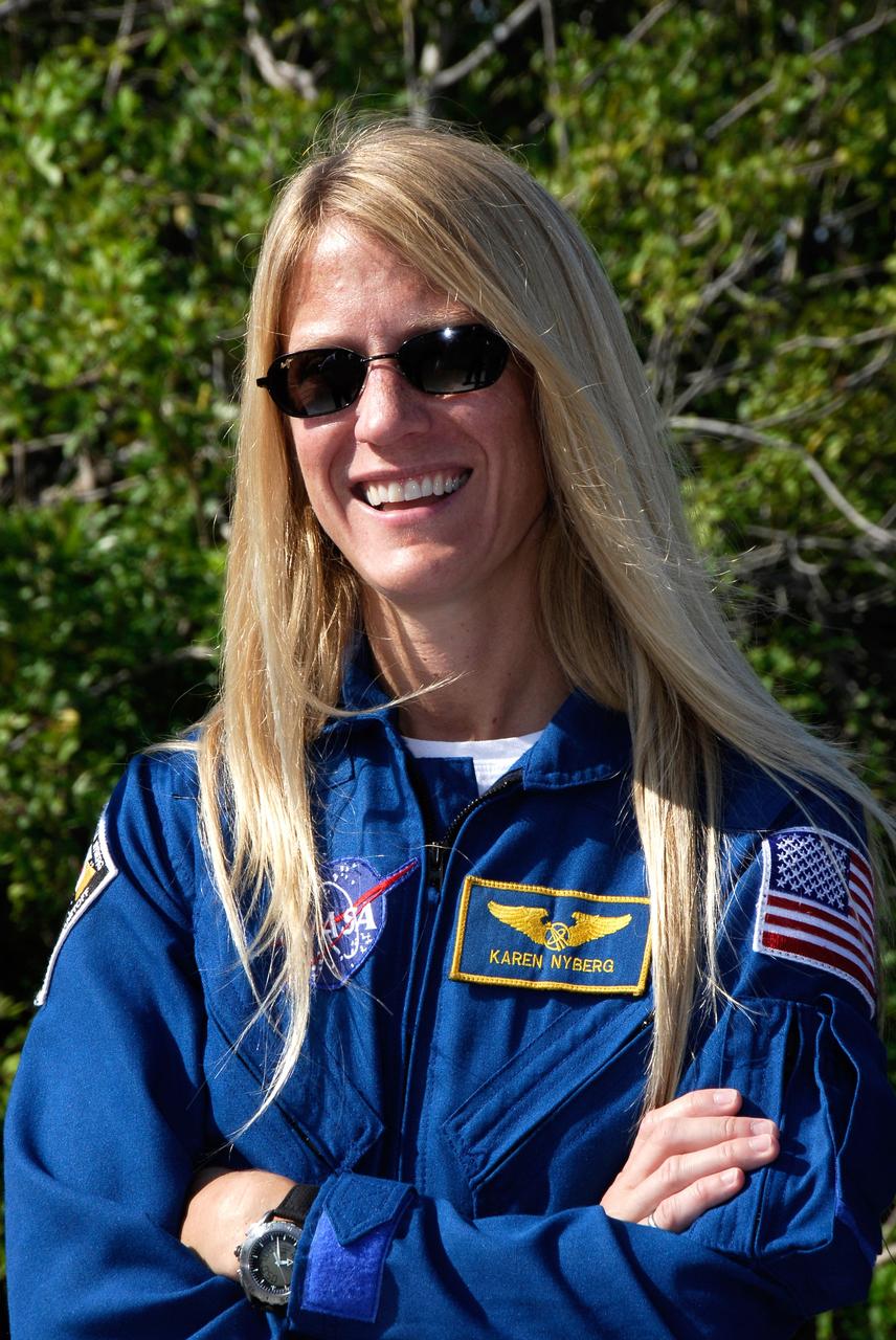 CAPE CANAVERAL, Fla. -- STS-124 Mission Specialist Karen Nyberg waits to begin training on the M113 armored personnel carrier on Launch Pad 39B. She and other crew members are at NASA's Kennedy Space Center for a dress launch rehearsal called the terminal countdown demonstration test. TCDT provides astronauts and ground crews with an opportunity to participate in various simulated countdown activities, including equipment familiarization and emergency training. On the STS-124 mission, the crew will deliver and install the Japanese Experiment Module – Pressurized Module and Japanese Remote Manipulator System. Discovery's launch is targeted for May 31. Photo credit: NASA/Kim Shiflett