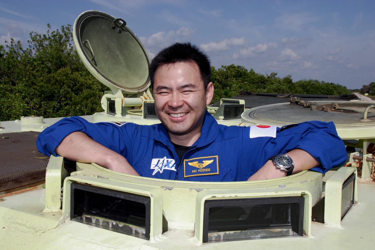 CAPE CANAVERAL, Fla. -- STS-124 Mission Specialist Akihiko Hoshide takes his place in the M113 armored personnel carrier, to practice driving as part of emergency training. He and other crew members are at NASA's Kennedy Space Center for a dress launch rehearsal called the terminal countdown demonstration test. TCDT provides astronauts and ground crews with an opportunity to participate in various simulated countdown activities, including equipment familiarization and emergency training. On the STS-124 mission, the crew will deliver and install the Japanese Experiment Module – Pressurized Module and Japanese Remote Manipulator System. Discovery's launch is targeted for May 31. Photo credit: NASA/Kim Shiflett