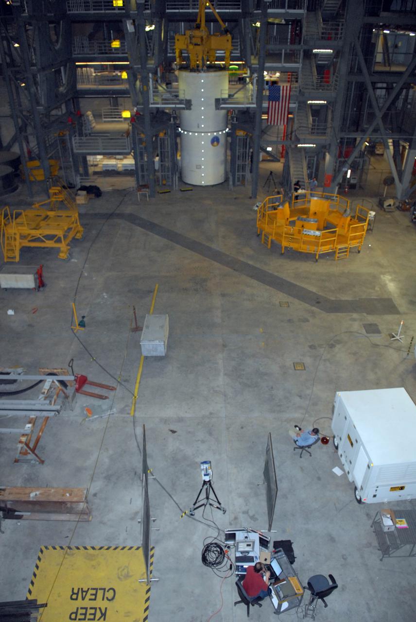 CAPE CANAVERAL, Fla. --  Vibration and laser testing is being conducted on Ares I-X segments at NASA's Kennedy Space Center. This is an overall view of the modal testing setup using the Inert Solid Rocket Motor Segment and Laser Vibrometer in high bay 4 of the Vehicle Assembly building.  Photo credit: NASA/Dimitri Gerondidakis