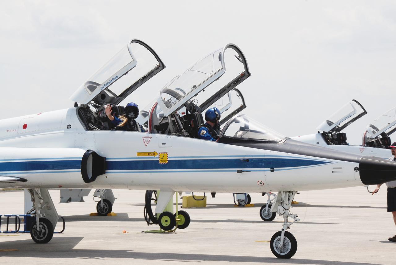 CAPE CANAVERAL, Fla. -- Two of the crewmembers for the STS-124 mission, Mission Specialists Ron Garan and Karen Nyberg, depart NASA's Kennedy Space Center in a T-38 training jet after a successful launch dress rehearsal called the terminal countdown demonstration test. The crew is expected to return in late May for the May 31 launch of space shuttle Discovery. On the STS-124 mission, the crew will deliver and install the Japanese Experiment Module – Pressurized Module and Japanese Remote Manipulator System. Photo credit: NASA/Kim Shiflett