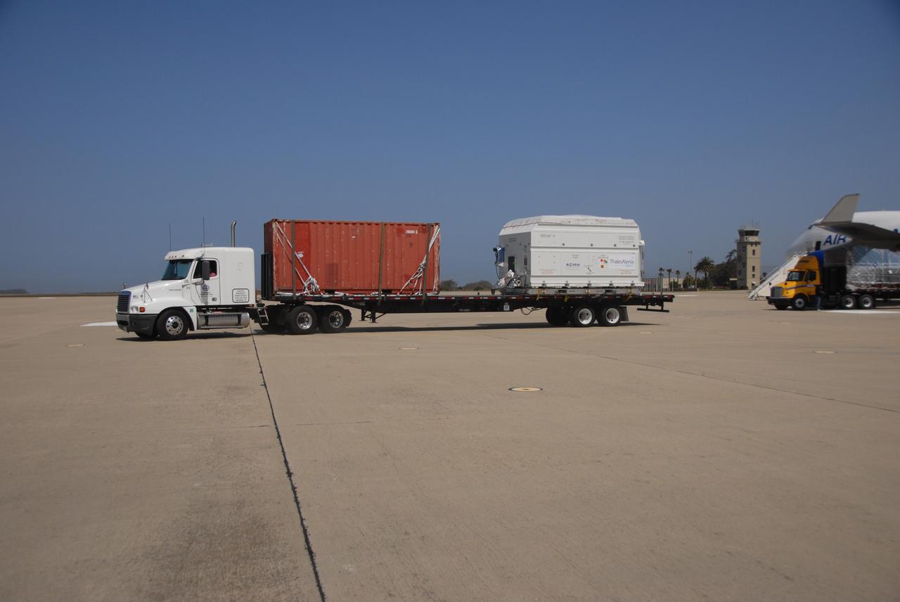 VANDENBERG AIR FORCE BASE, Calif. --  At Vandenberg Air Force Base, the truck carrying the OSTM/Jason-2 satellite is ready to transport the cargo to the Astrotech processing facility.  The OSTM, or Ocean Topography Mission, on the Jason-2 satellite is a follow-on to Jason-1. It will take oceanographic studies of sea surface height into an operational mode for continued climate forecasting research and science and industrial applications.  This satellite altimetry data will help determine ocean circulation, climate change and sea-level rise. OSTM is a joint effort by the National Oceanic and Atmospheric Administration, NASA, France’s Centre National d’Etudes Spatiales and the European Meteorological Satellite Organisation. OSTM/Jason-2 will be launched aboard a United Launch Alliance Delta II 7320 from Vandenberg on June 15.  Photo credit: NASA/Dan Liberotti