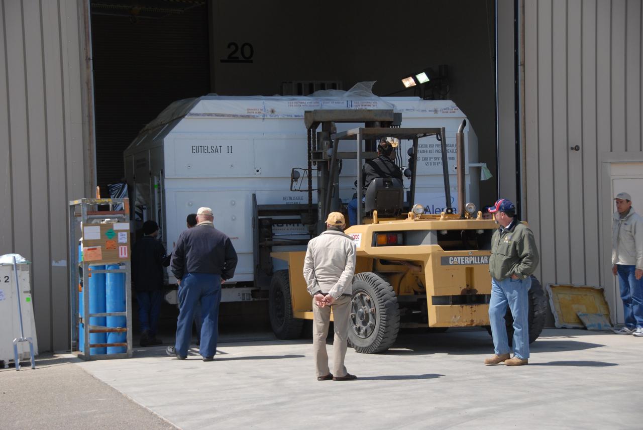 VANDENBERG AIR FORCE BASE, Calif. --  At Vandenberg Air Force Base, the OSTM/Jason-2 satellite shipping container is being moved inside the Astrotech processing facility. The OSTM, or Ocean Topography Mission, on the Jason-2 satellite is a follow-on to Jason-1. It will take oceanographic studies of sea surface height into an operational mode for continued climate forecasting research and science and industrial applications.  This satellite altimetry data will help determine ocean circulation, climate change and sea-level rise. OSTM is a joint effort by the National Oceanic and Atmospheric Administration, NASA, France’s Centre National d’Etudes Spatiales and the European Meteorological Satellite Organisation. OSTM/Jason-2 will be launched aboard a United Launch Alliance Delta II 7320 from Vandenberg on June 15.  Photo credit: NASA/Dan Liberotti