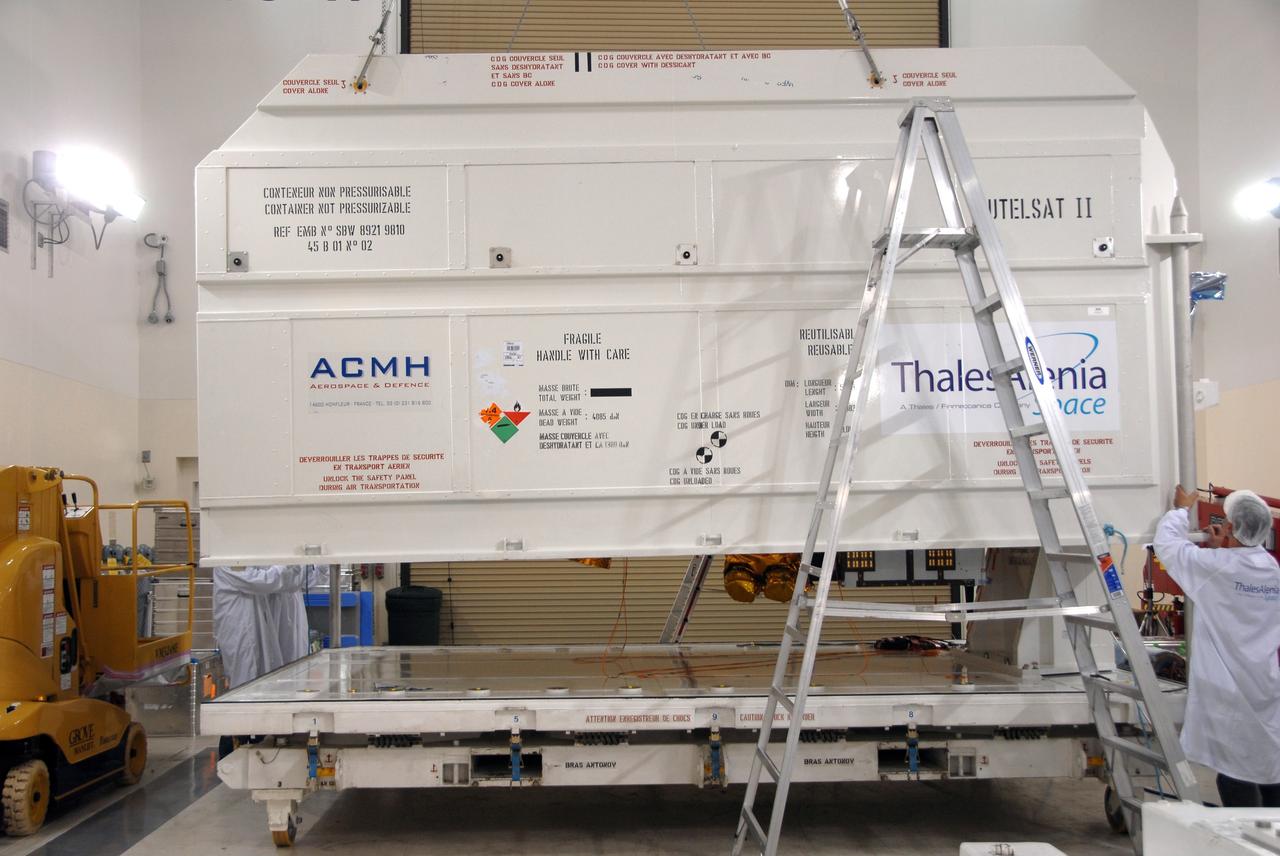 VANDENBERG AIR FORCE BASE, Calif. -- Inside the Astrotech processing facility at Vandenberg Air Force Base, the shipping container is removed from the OSTM/Jason-2 spacecraft. The OSTM, or Ocean Topography Mission, on the Jason-2 satellite is a follow-on to Jason-1. It will take oceanographic studies of sea surface height into an operational mode for continued climate forecasting research and science and industrial applications.  This satellite altimetry data will help determine ocean circulation, climate change and sea-level rise. OSTM is a joint effort by the National Oceanic and Atmospheric Administration, NASA, France’s Centre National d’Etudes Spatiales and the European Meteorological Satellite Organisation. OSTM/Jason-2 will be launched aboard a United Launch Alliance Delta II 7320 from Vandenberg on June 15.  Photo credit: NASA/Mark Mackley