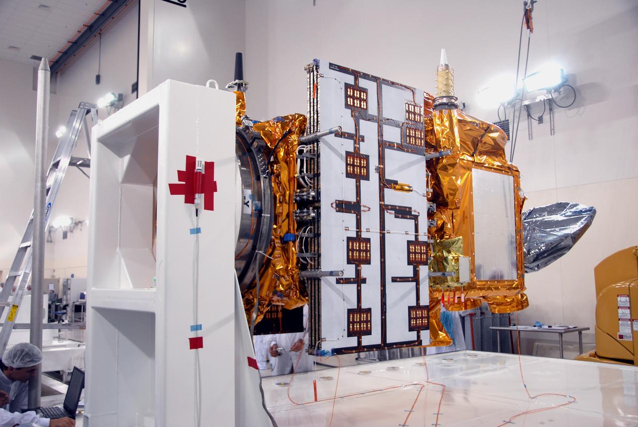 VANDENBERG AIR FORCE BASE, Calif. -- Another view of the OSTM/Jason-2 spacecraft after removal of the shipping container in the Astrotech processing facility at Vandenberg Air Force Base.  The OSTM, or Ocean Topography Mission, on the Jason-2 satellite is a follow-on to Jason-1. It will take oceanographic studies of sea surface height into an operational mode for continued climate forecasting research and science and industrial applications.  This satellite altimetry data will help determine ocean circulation, climate change and sea-level rise. OSTM is a joint effort by the National Oceanic and Atmospheric Administration, NASA, France’s Centre National d’Etudes Spatiales and the European Meteorological Satellite Organisation. OSTM/Jason-2 will be launched aboard a United Launch Alliance Delta II 7320 from Vandenberg on June 15.  Photo credit: NASA/Mark Mackley