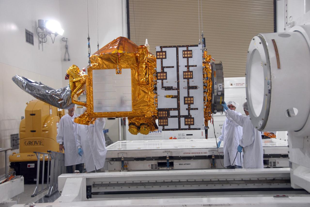 VANDENBERG AIR FORCE BASE, Calif. -- Inside the Astrotech processing facility at Vandenberg Air Force Base, the OSTM/Jason-2 spacecraft is lifted from its stand to be moved to a tilt dolly.  The OSTM, or Ocean Topography Mission, on the Jason-2 satellite is a follow-on to Jason-1. It will take oceanographic studies of sea surface height into an operational mode for continued climate forecasting research and science and industrial applications.  This satellite altimetry data will help determine ocean circulation, climate change and sea-level rise. OSTM is a joint effort by the National Oceanic and Atmospheric Administration, NASA, France’s Centre National d’Etudes Spatiales and the European Meteorological Satellite Organisation. OSTM/Jason-2 will be launched aboard a United Launch Alliance Delta II 7320 from Vandenberg on June 15.  Photo credit: NASA/Mark Mackley