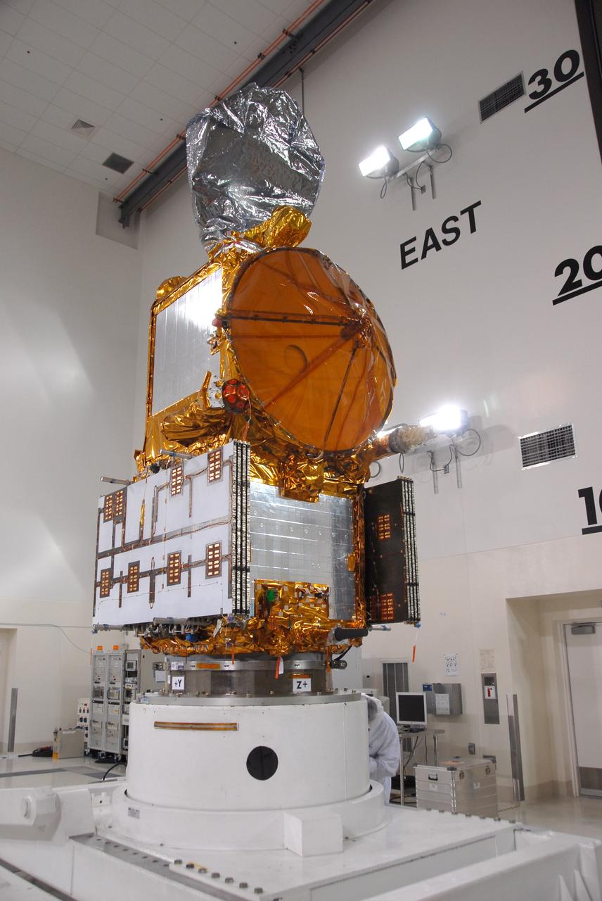 VANDENBERG AIR FORCE BASE, Calif. --  Inside the Astrotech processing facility at Vandenberg Air Force Base, the OSTM/Jason-2 spacecraft has been lifted to a vertical position on the tilt dolly.  The OSTM, or Ocean Topography Mission, on the Jason-2 satellite is a follow-on to Jason-1. It will take oceanographic studies of sea surface height into an operational mode for continued climate forecasting research and science and industrial applications.  This satellite altimetry data will help determine ocean circulation, climate change and sea-level rise. OSTM is a joint effort by the National Oceanic and Atmospheric Administration, NASA, France’s Centre National d’Etudes Spatiales and the European Meteorological Satellite Organisation. OSTM/Jason-2 will be launched aboard a United Launch Alliance Delta II 7320 from Vandenberg on June 15.  Photo credit: NASA/Mark Mackley