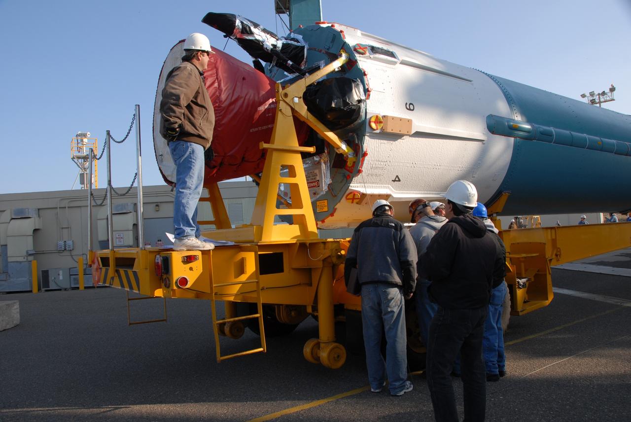 VANDENBERG AIR FORCE BASE, Calif. --  At Vandenberg Air Force Base in California, workers on Space Launch Complex 2 prepare to raise the Delta II first stage of the OSTM/Jason-2 spacecraft.  Once it is vertical, the first stage will be transferred into the mobile service tower.  The OSTM, or Ocean Topography Mission, on the Jason-2 satellite is a follow-on to Jason-1. It will take oceanographic studies of sea surface height into an operational mode for continued climate forecasting research and science and industrial applications.  This satellite altimetry data will help determine ocean circulation, climate change and sea-level rise. OSTM is a joint effort by the National Oceanic and Atmospheric Administration, NASA, France’s Centre National d’Etudes Spatiales and the European Meteorological Satellite Organisation. OSTM/Jason-2 will be launched aboard a United Launch Alliance Delta II 7320 from Vandenberg on June 15.  Photo credit: NASA/Dan Liberotti