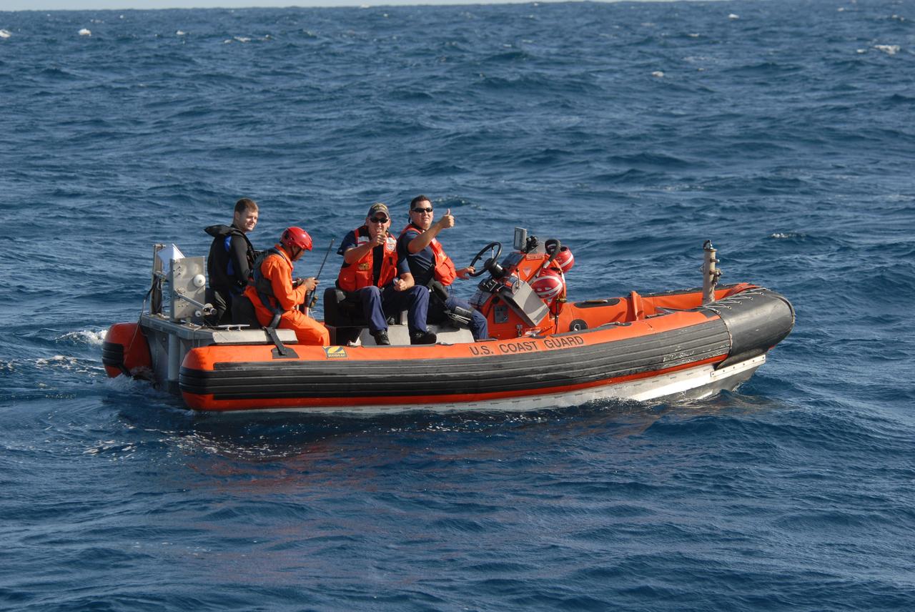 CAPE CANAVERAL, Fla. -- Participants in a rescue training exercise, known as Mode VIII, are successfully launched from a U.S. Coast Guard rescue boat off Florida's central east coast. In support of, and with logistical support from, NASA, USSTRATCOM is hosting a major exercise involving Department of Defense, Department of Homeland Security, search and rescue (SAR) forces, including the 45th Space Wing at Patrick Air Force Base, which support space shuttle astronaut bailout contingency operations, known as Mode VIII. This exercise tests SAR capabilities to locate, recover and provide medical treatment for astronauts following a space shuttle launch phase open-ocean bailout. Participants include members of the U.S. Navy, U.S. Coast Guard, U.S. Air Force, and NASA's Kennedy Space Center and Johnson Space Center. Photo credit: NASA/Dimitri Gerondidakis