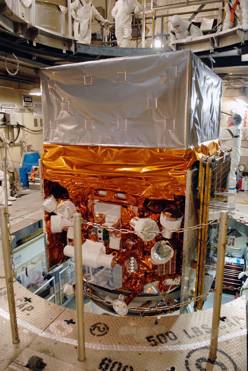CAPE CANAVERAL, Fla. --  Inside the mobile service tower on Launch Pad 17-B at Cape Canaveral Air Force Station, NASA's Gamma-Ray Large Area Space Telescope, or GLAST, is ready for encapsulation in the payload fairing. The fairing is a molded structure that fits flush with the outside surface of the Delta II upper stage booster and forms an aerodynamically smooth nose cone, protecting the spacecraft during launch and ascent. GLAST  is a powerful space observatory that will explore the Universe's ultimate frontier, where nature harnesses forces and energies far beyond anything possible on Earth;  probe some of science's deepest questions, such as what our Universe is made of, and search for new laws of physics; explain how black holes accelerate jets of material to nearly light speed; and help crack the mystery of stupendously powerful explosions known as gamma-ray bursts. The launch date is targeted no earlier than June 3. Photo credit: NASA/Jim Grossmann