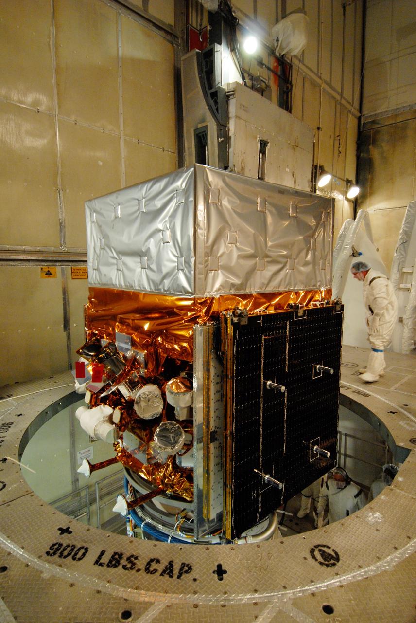CAPE CANAVERAL, Fla. --  Inside the mobile service tower on Launch Pad 17-B at Cape Canaveral Air Force Station, NASA's Gamma-Ray Large Area Space Telescope, or GLAST, is ready for encapsulation in the payload fairing. The fairing is a molded structure that fits flush with the outside surface of the Delta II upper stage booster and forms an aerodynamically smooth nose cone, protecting the spacecraft during launch and ascent. GLAST  is a powerful space observatory that will explore the Universe's ultimate frontier, where nature harnesses forces and energies far beyond anything possible on Earth;  probe some of science's deepest questions, such as what our Universe is made of, and search for new laws of physics; explain how black holes accelerate jets of material to nearly light speed; and help crack the mystery of stupendously powerful explosions known as gamma-ray bursts. The launch date is targeted no earlier than June 3. Photo credit: NASA/Jim Grossmann