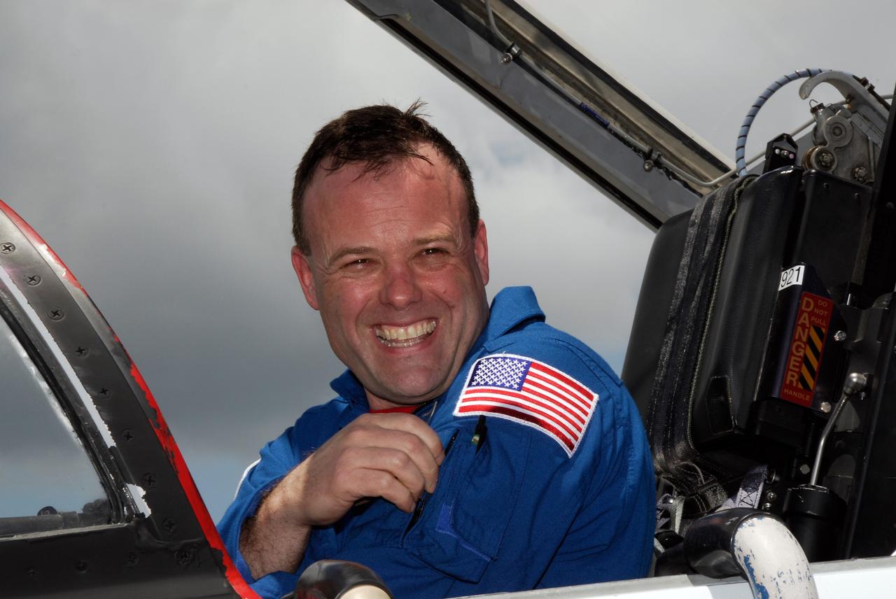 CAPE CANAVERAL, Fla. -- The crew of space shuttle Discovery's STS-124 mission arrives at the Shuttle Landing Facility at NASA's Kennedy Space Center aboard T-38 jet trainers to get ready for launch. Seen here is Mission Specialist Ron Garan, who is making his first shuttle flight. Launch of Discovery is scheduled for 5:02 p.m. May 31. On the STS-124 mission, the crew of seven will deliver and install the Japanese Experiment Module – Pressurized Module and Japanese Remote Manipulator System. Photo credit: NASA/Kim Shiflett