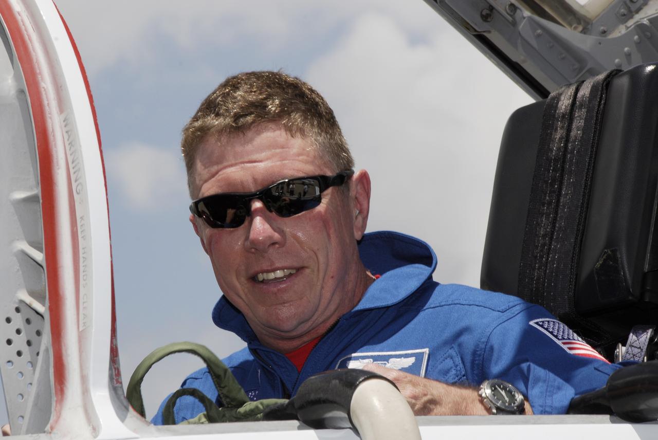 CAPE CANAVERAL, Fla. -- The crew of space shuttle Discovery's STS-124 mission arrives at the Shuttle Landing Facility at NASA's Kennedy Space Center aboard T-38 jet trainers to get ready for launch. Seen here is Mission Specialist Mike Fossum, who is making his second shuttle flight. Launch of Discovery is scheduled for 5:02 p.m. May 31. On the STS-124 mission, the crew of seven will deliver and install the Japanese Experiment Module – Pressurized Module and Japanese Remote Manipulator System. Photo credit: NASA/Kim Shiflett