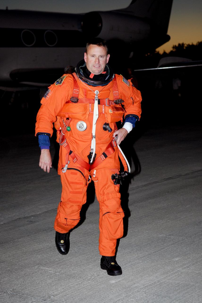 CAPE CANAVERAL, Fla. -- On the Shuttle Landing Facility at NASA's Kennedy Space Center, STS-124 Pilot Ken Ham walks away from the shuttle training aircraft after landing practice. The STA is a Grumman American Aviation-built Gulf Stream II jet that was modified to simulate an orbiter's cockpit, motion and visual cues, and handling qualities. In flight, the aircraft duplicates the orbiter's atmospheric descent trajectory from approximately 35,000 feet altitude to landing on a runway. Space shuttle Discovery is scheduled to lift off on the STS-124 mission at 5:02 p.m. May 31. Photo credit: NASA/Kim Shiflett
