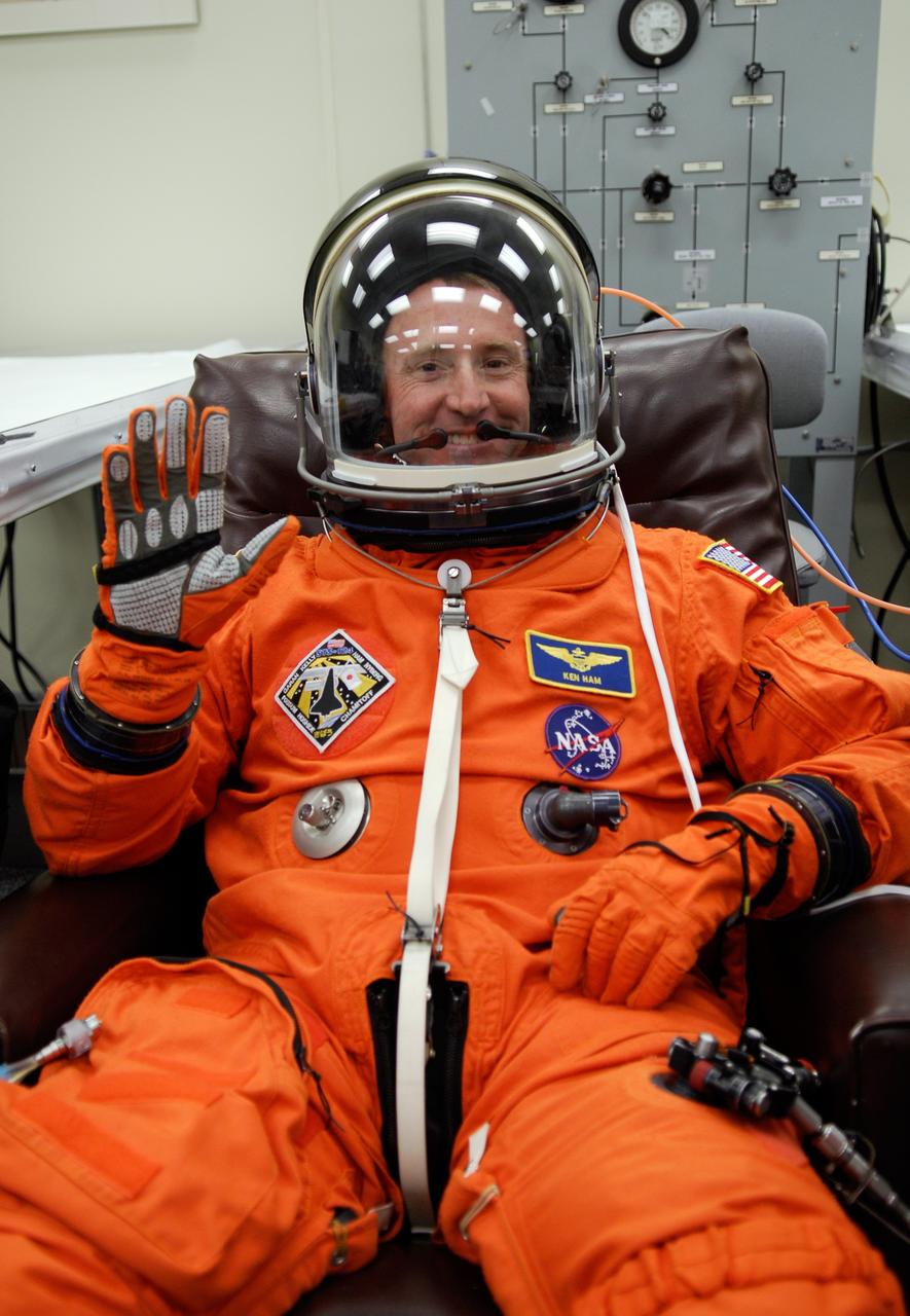 CAPE CANAVERAL, Fla. -- Crew members for space shuttle Discovery's STS-124 mission don their launch and entry suits before heading to Launch Pad 39A. Pilot Ken Ham is fully suited, with helmet and gloves on, and ready for liftoff. The STS-124 mission is the second of three flights launching components to complete the Japan Aerospace Exploration Agency's Kibo laboratory. The shuttle crew will install Kibo's large Japanese Pressurized Module and its remote manipulator system, or RMS. The 14-day flight includes three spacewalks. Launch is scheduled for 5:02 p.m. May 31. Photo credit: NASA/Kim Shiflett