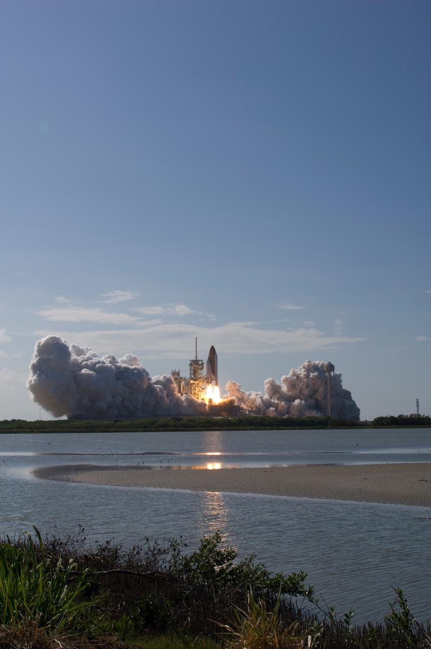 CAPE CANAVERAL, Fla. --  Hills of smoke and steam rise from Launch Pad 39A at NASA's Kennedy Space Center as space shuttle Discovery lifts off on its STS-124 mission to the International Space Station. Launch was on time at 5:02 p.m. EDT.  Discovery is making its 35th flight.  The STS-124 mission is the 26th in the assembly of the space station.  It is the second of three flights launching components to complete the Japan Aerospace Exploration Agency's Kibo laboratory.  The shuttle crew will install Kibo's large Japanese Pressurized Module and its remote manipulator system, or RMS.  The 14-day flight includes three spacewalks. Photo credit: NASA/Sandra Joseph, Tony Gray, Robert Murray, Mike Kerley